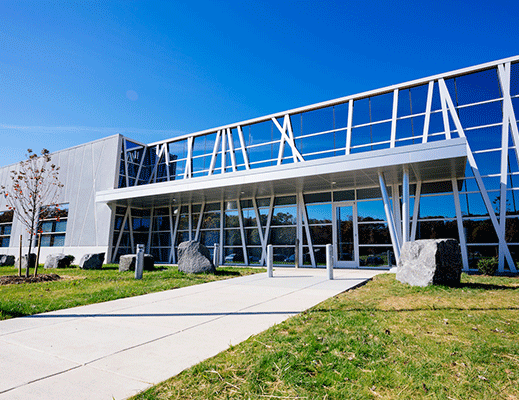 Glass and steel exterior of Cloud HQ data center.