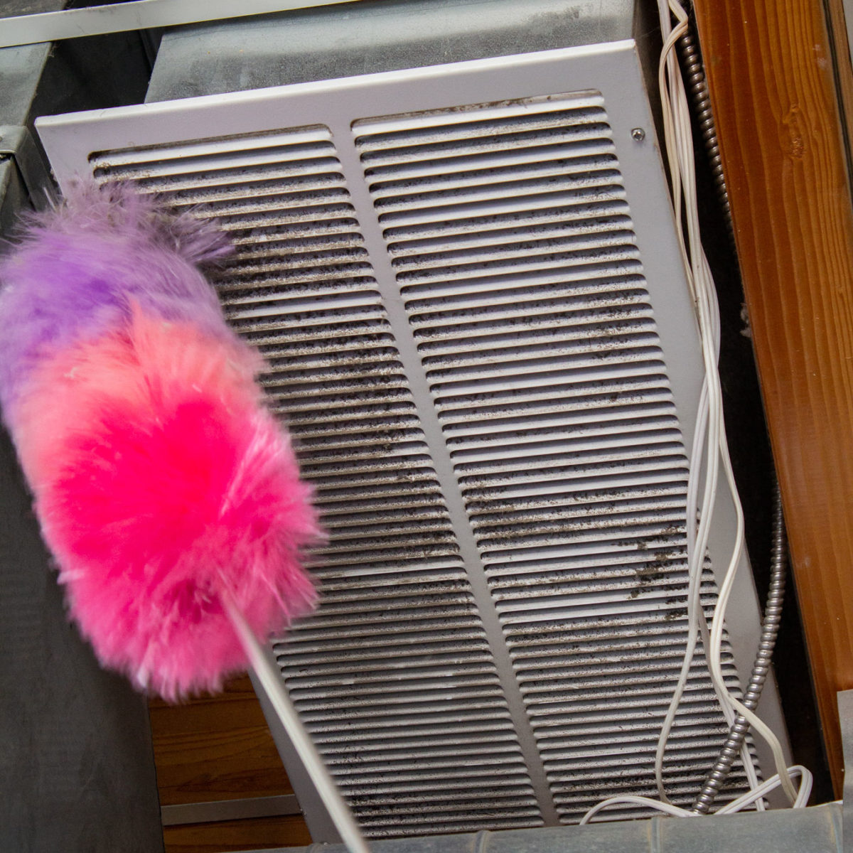 Deep cleaning HVAC vents.