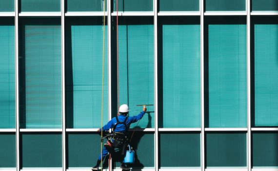 Cleaning exterior windows.