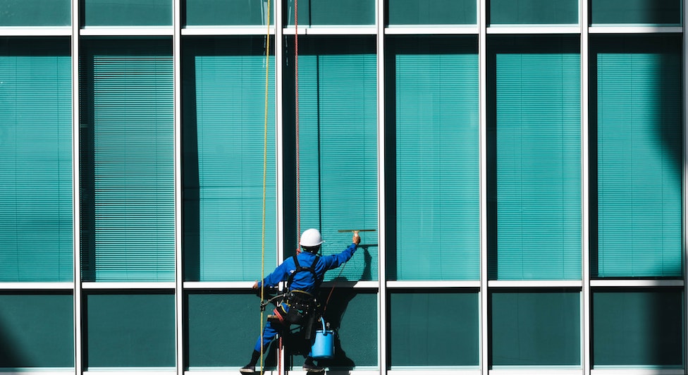 Cleaning exterior windows.